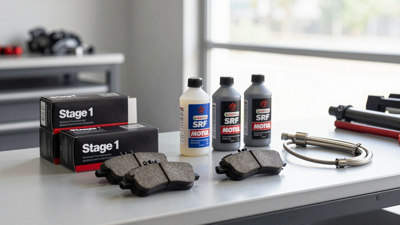 Performance brake pads, fluid, and braided lines on a workbench